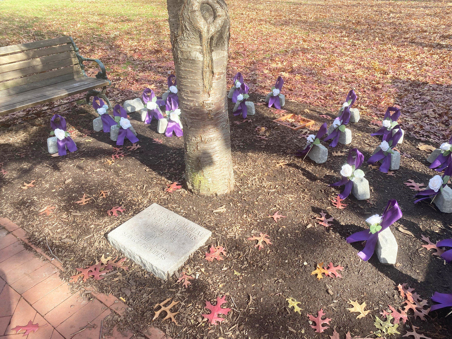 The memorial for the 26 victims of domestic violence murders at the "Living Memorial To Crime Victims" at the park grounds off South Main Street.
